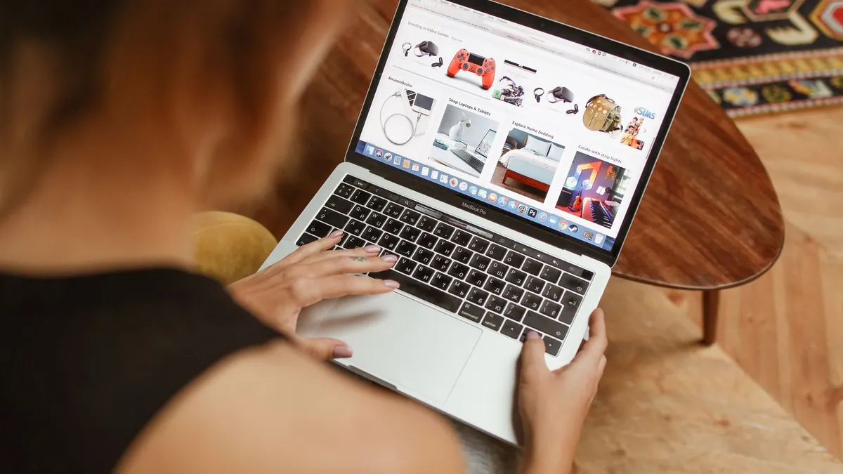 A person searching online on a laptop at home